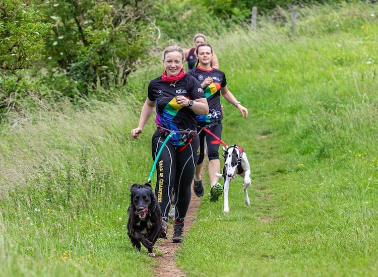Emily Thomas, canicross instructor, demonstrating how to run with your dog